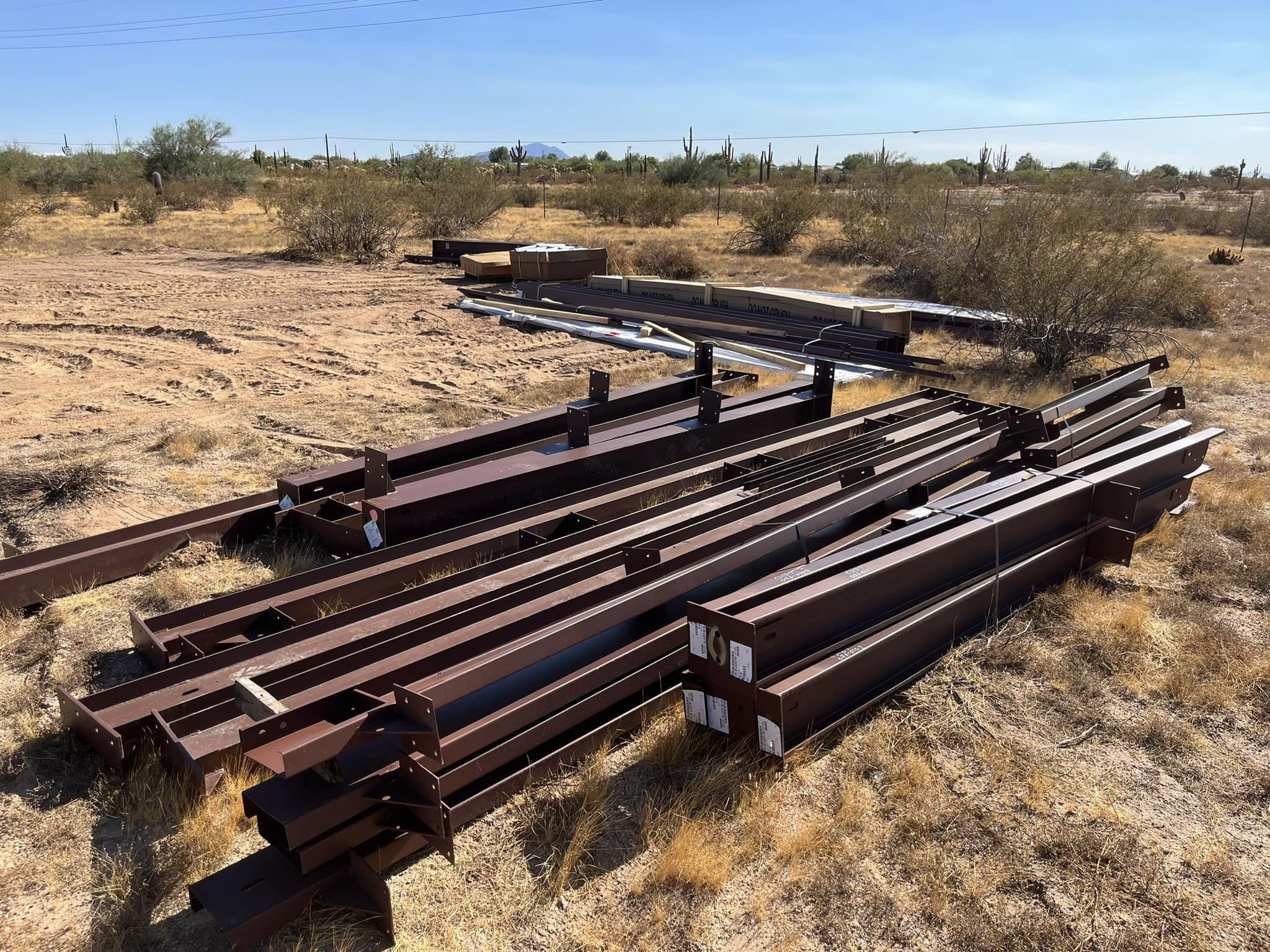 A pile of metal bars in the middle of nowhere.
