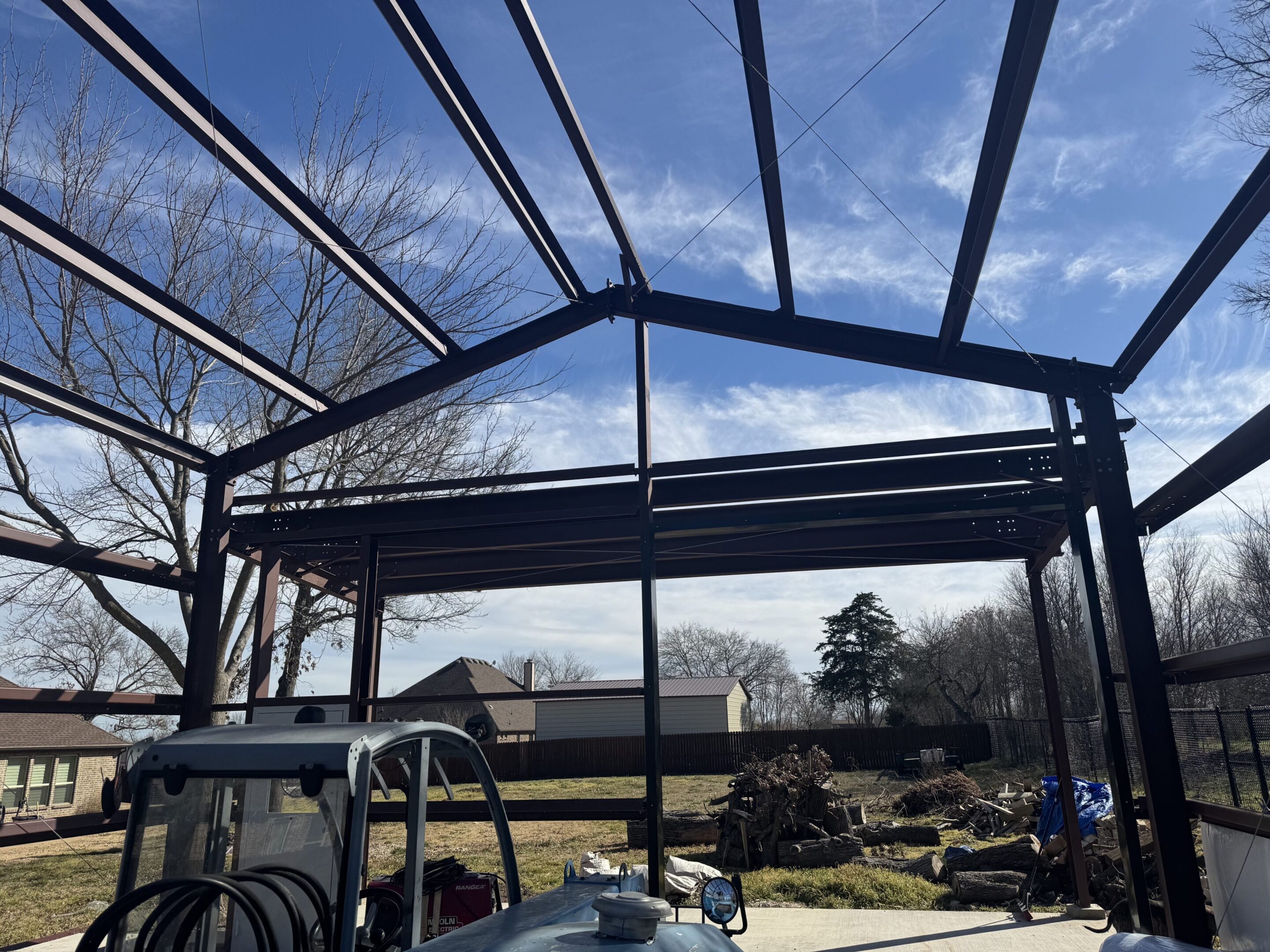 A metal structure with a sky background